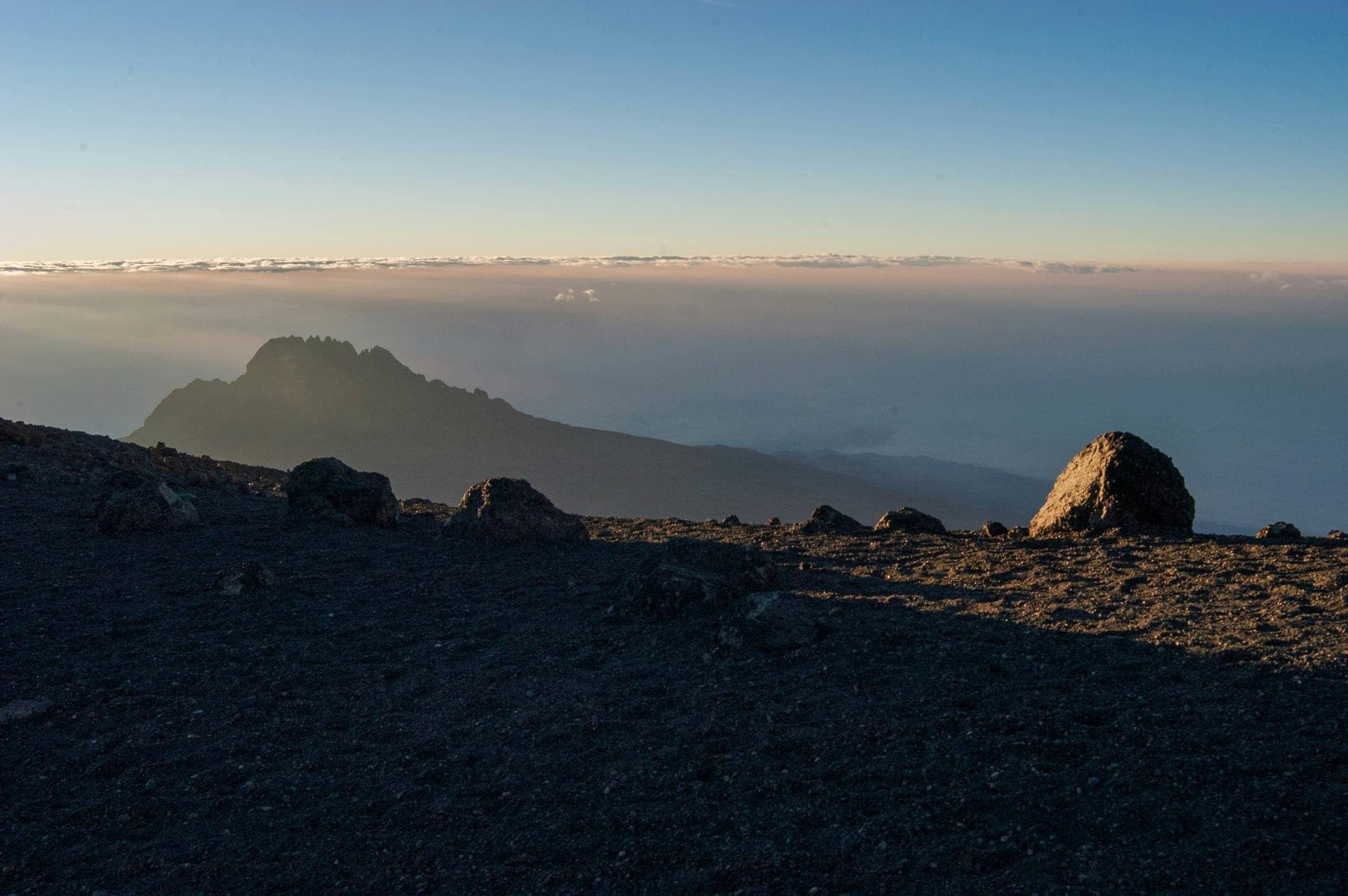 Trekkers approaching Mount Kilimanjaro