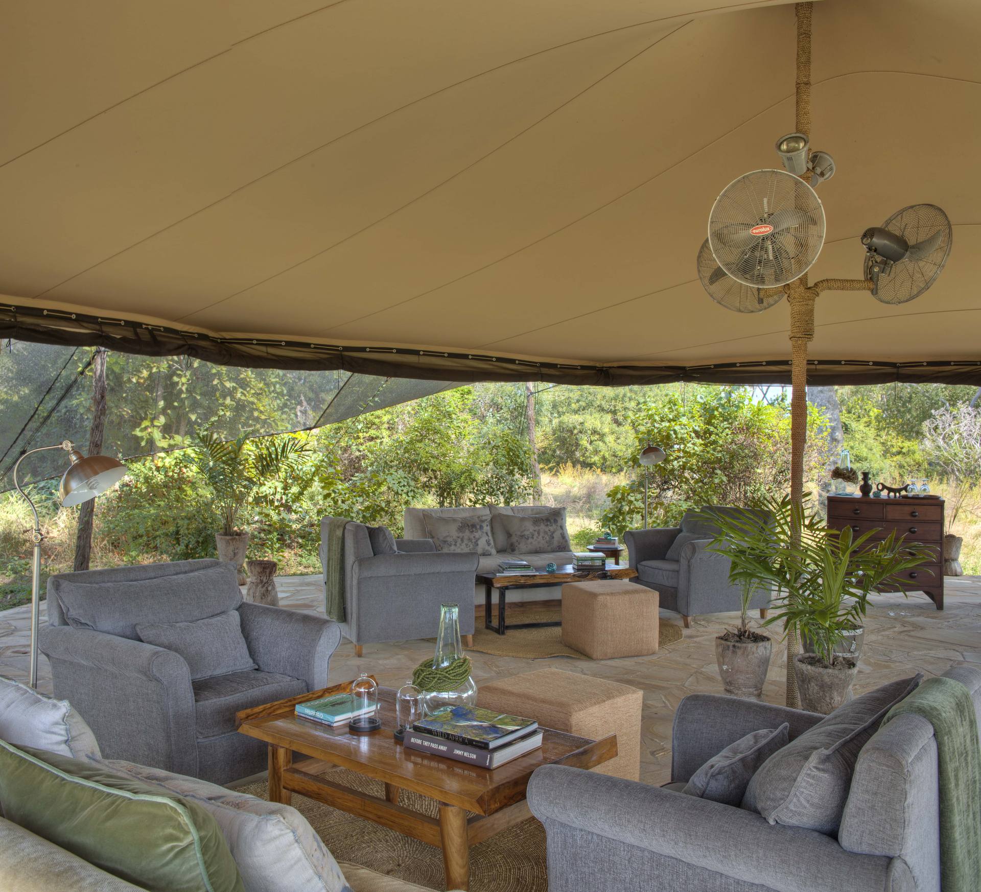 Guests enjoying sundowners at a Tanzanian lodge