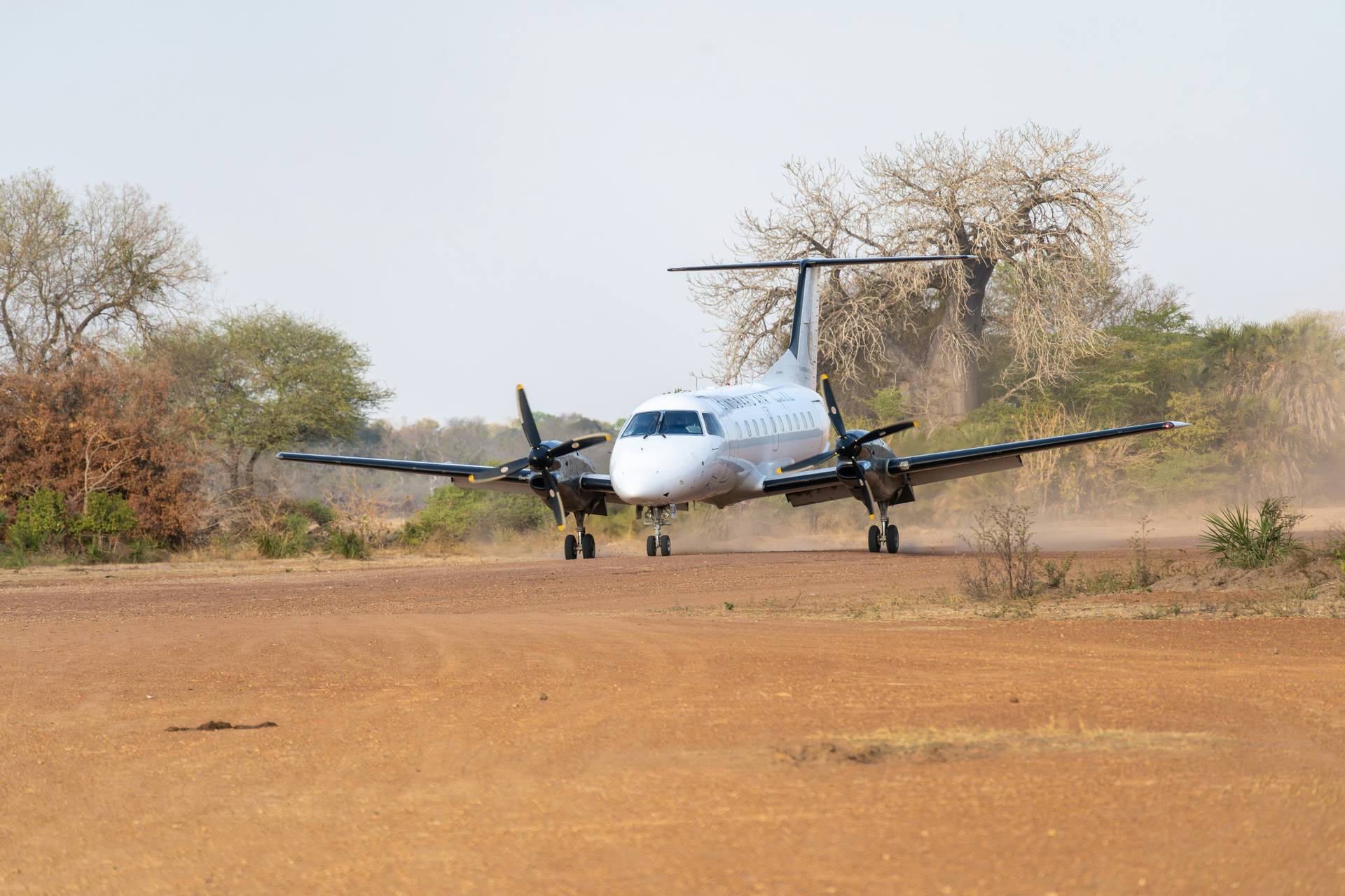 A small plane on a remote bush airstrip in Tanzania